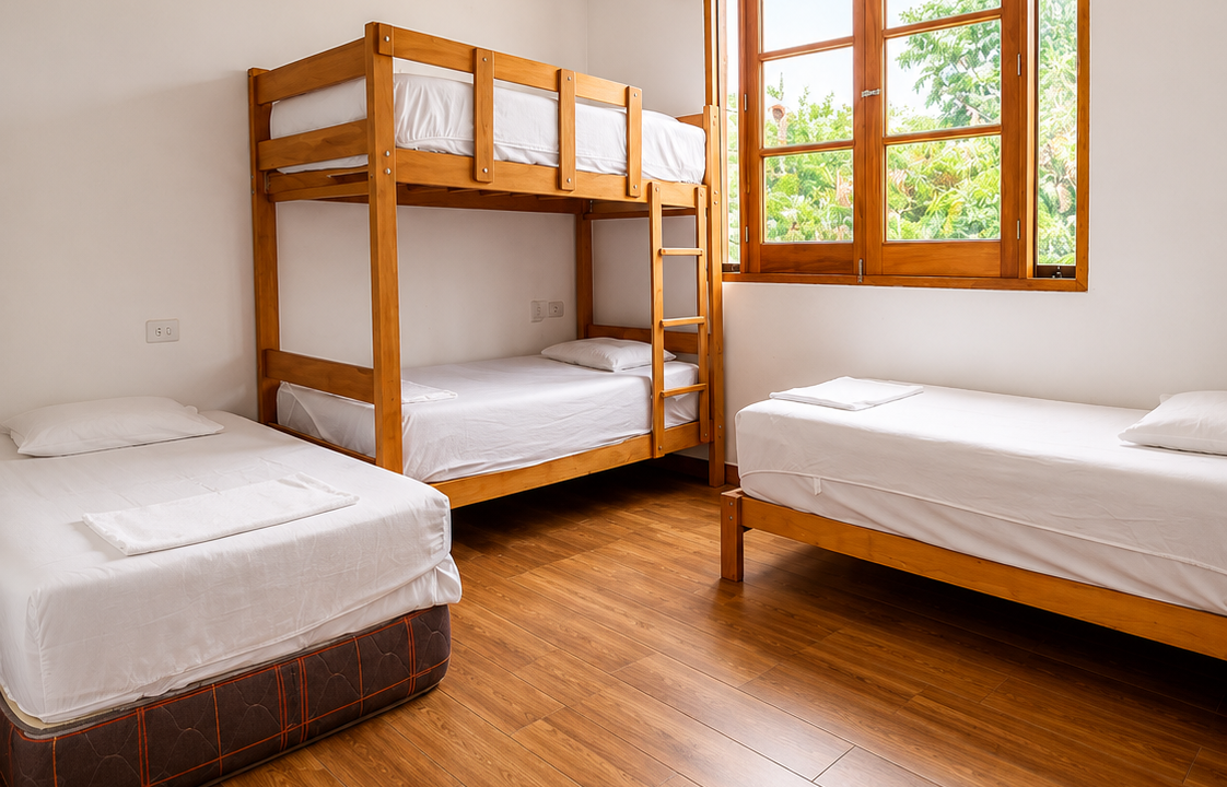 Dormitorio familiar con varias camas